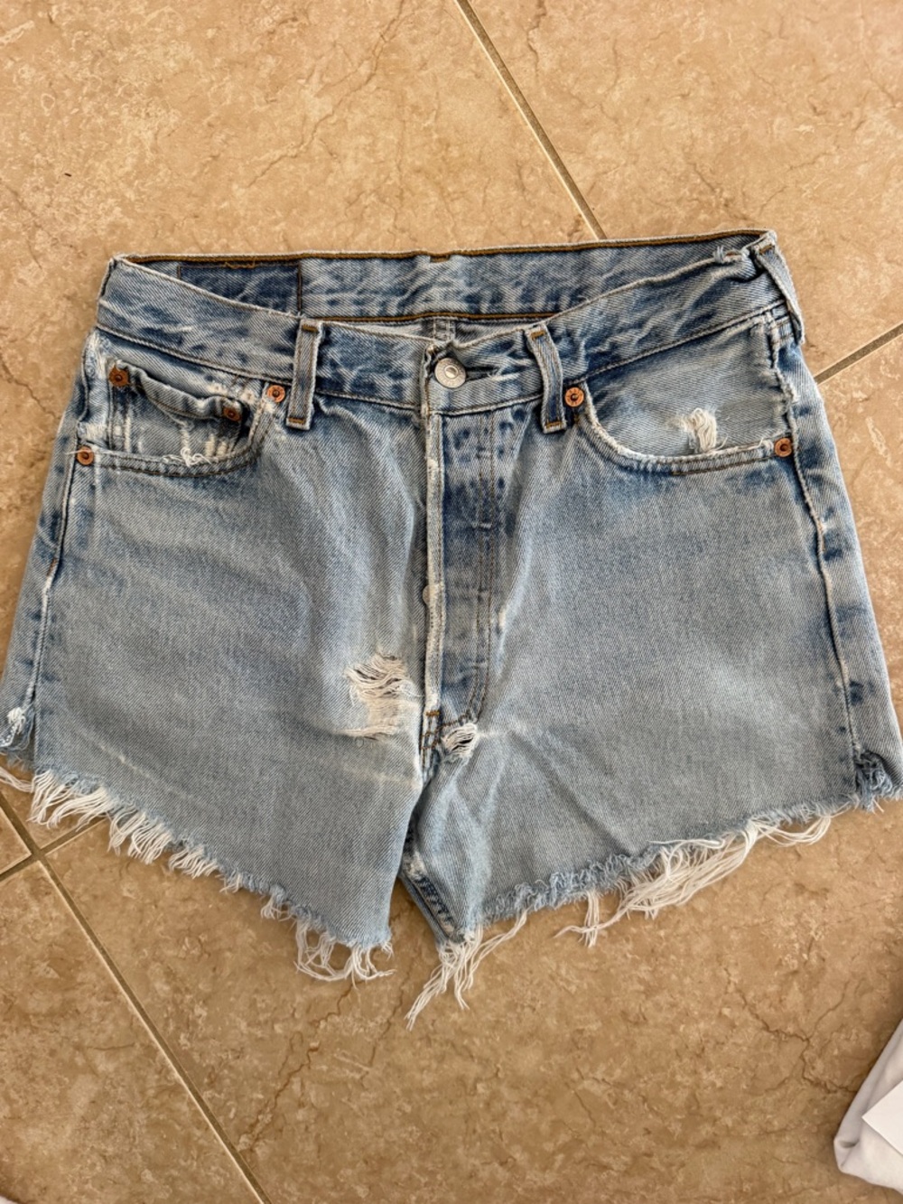 Vintage Levi’s Light Wash Distressed Denim Cutoff Shorts